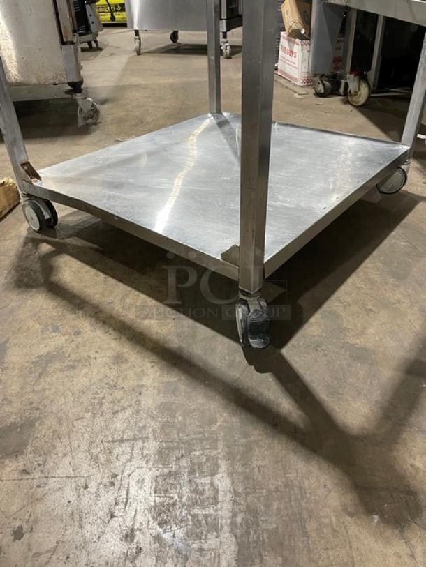 Alto-Shaam CTP720E combi oven undershelf equipment stand, stainless steel, on wheels for mobility.