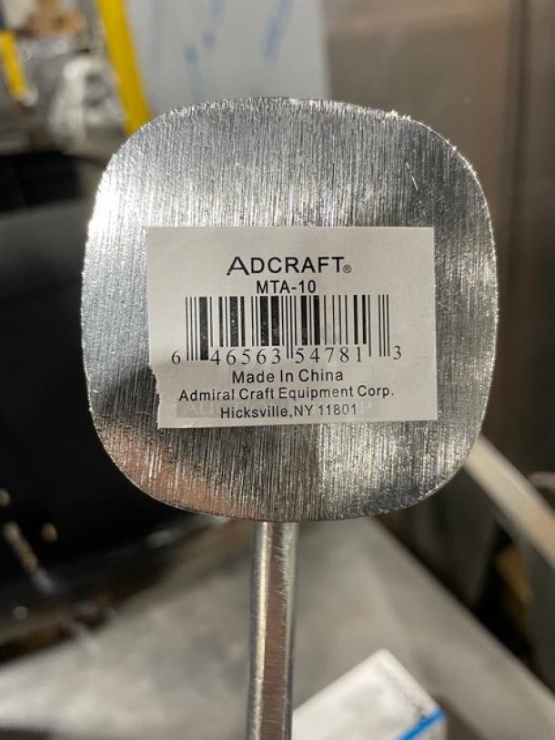 NEW Adcraft MTA-10 handheld meat tenderizer, 10-1/2" heavy cast aluminum, model label with barcode visible.