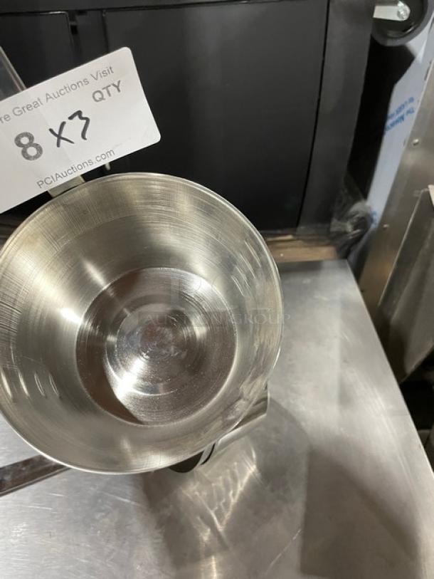 Adcraft 32 oz. stainless steel dipper ladle, model D-32GSA, new condition. Auction tag visible.