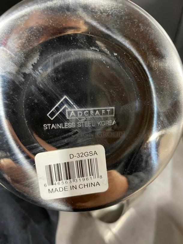 Adcraft Commercial 32 Oz. Dipper Ladle, Model D-32GSA, Stainless Steel, New Condition, "Made in China" label visible.