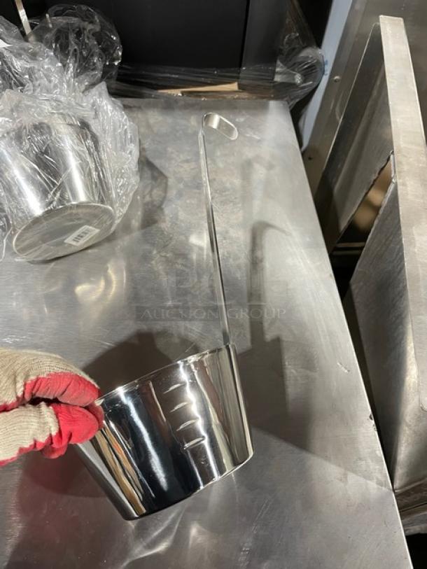 Adcraft stainless steel 32 oz. ladle, model D-32GSA, new condition. Features long handle and high-polish finish.