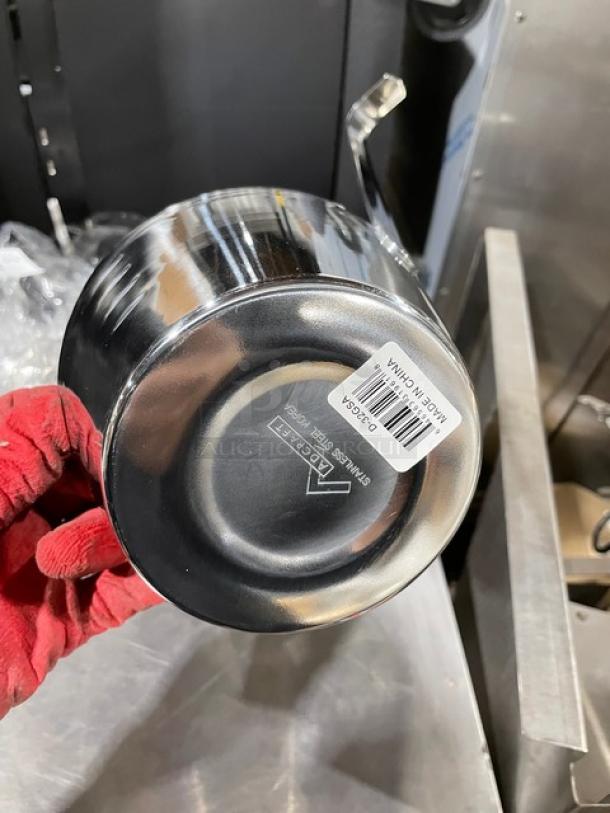 Adcraft D32GSA stainless steel dipper ladle, 32 oz. capacity, new condition. Features a label indicating "Made in China".