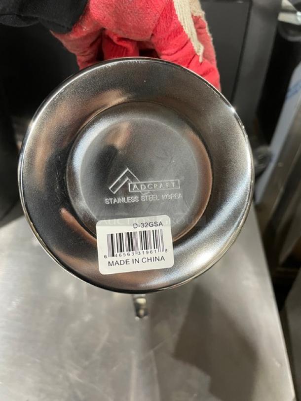 Adcraft stainless steel 32 oz. dipper ladle, Model D32GSA, new condition, labeled "Made in China."