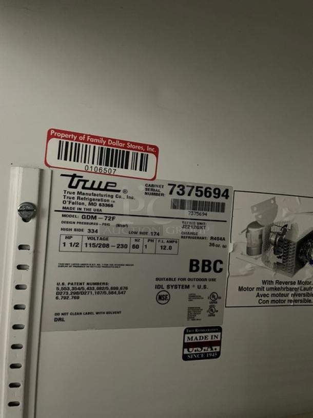 True Commercial Freezer Model GDM-72F. Triple glass swing doors, poly coated racks. Serial 7375694, 115/208-230V, 1 phase.