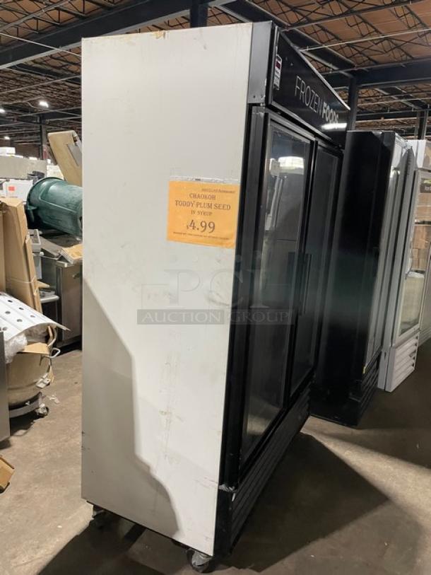 True Commercial Double Glass Door Freezer, Model GDM-49F, black, on casters, poly coated wired rack, 115/208-230V.