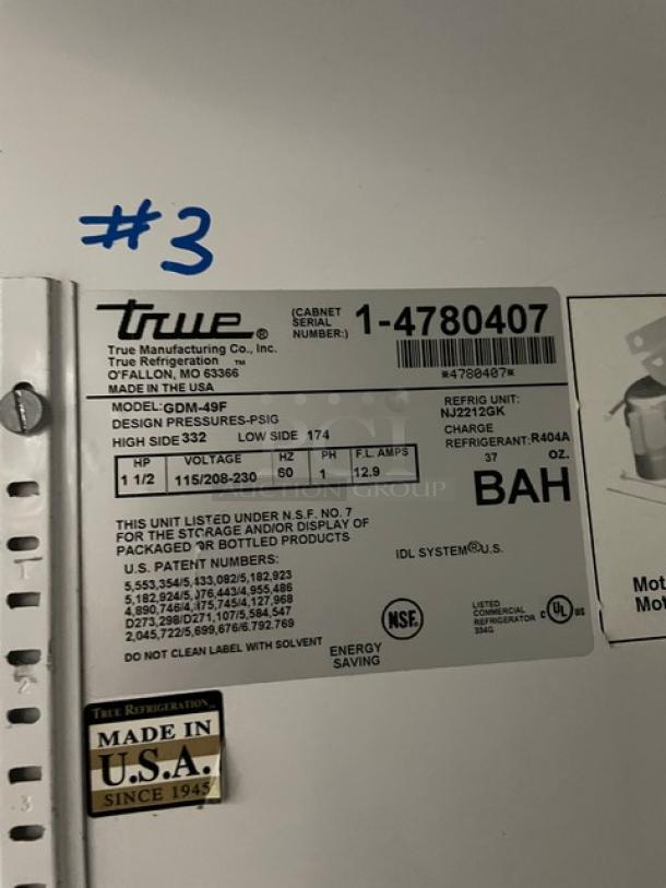 True GDM-49F commercial freezer, double glass swing door, poly coated rack, Model: GDM49F SN: 1-4780407, 115/208-230V, on casters.