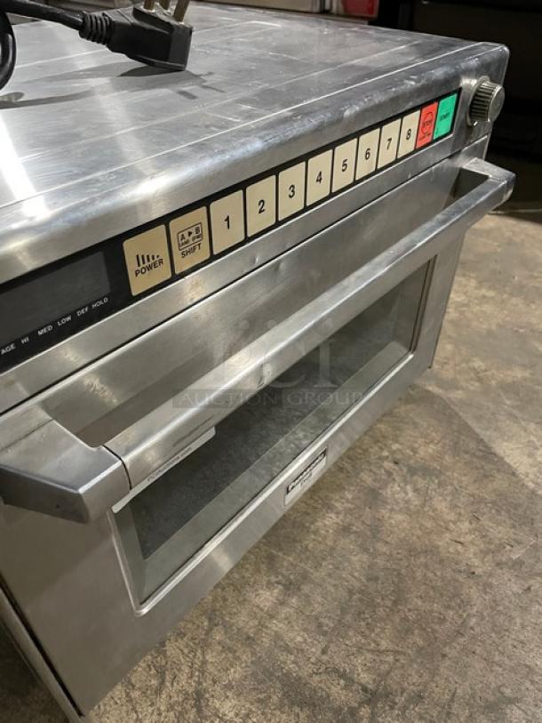 Panasonic NE-2180 Pro II Series stainless steel microwave oven, featuring a keypad, labeled controls, and power settings.
