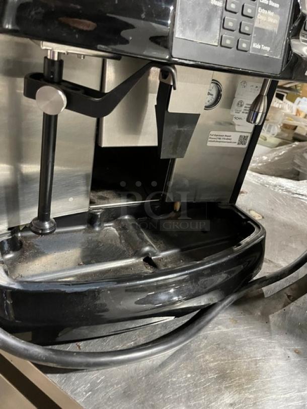 Schaerer Coffee Art Plus commercial espresso machine, model SCA1, black/stainless steel, with 2 hoppers, visible controls.