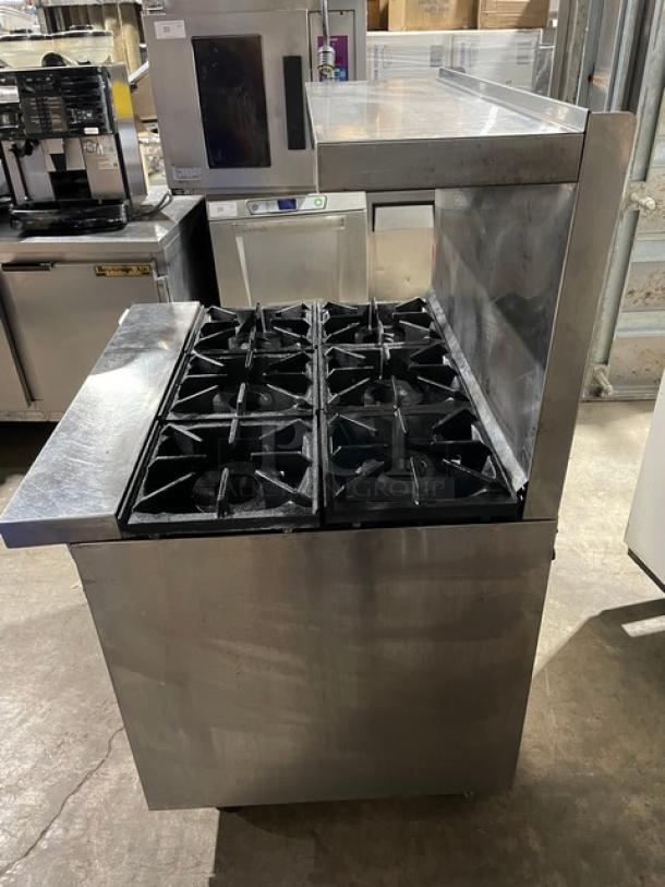 Bakers Pride 6-burner stainless steel range/oven combo with backsplash, overhead salamander shelf, and casters. Model 36BP6BS30N.