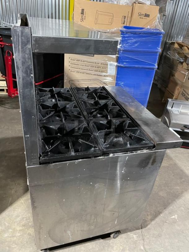 Bakers Pride 6-burner stainless steel range/oven with backsplash, overhead salamander shelf, and wired oven rack, model 36BP6BS30N.