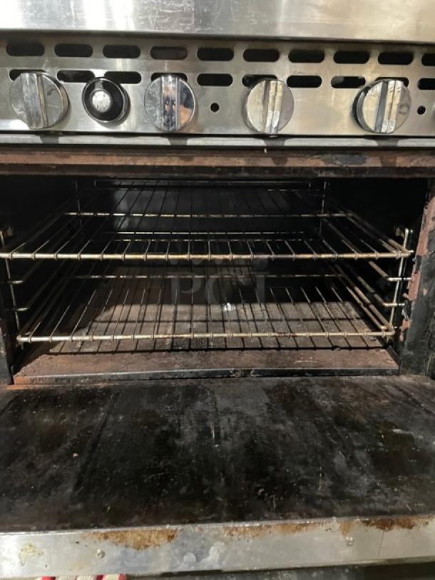 Bakers Pride 36BP6BS30N stainless steel 6-burner range/oven combo with backsplash, salamander shelf, wired oven rack, on casters.