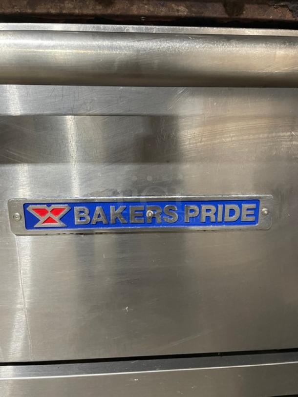 Bakers Pride commercial stainless steel 6-burner range/oven combo, Model 36BP6BS30N, with backsplash, overhead salamander shelf, and casters.