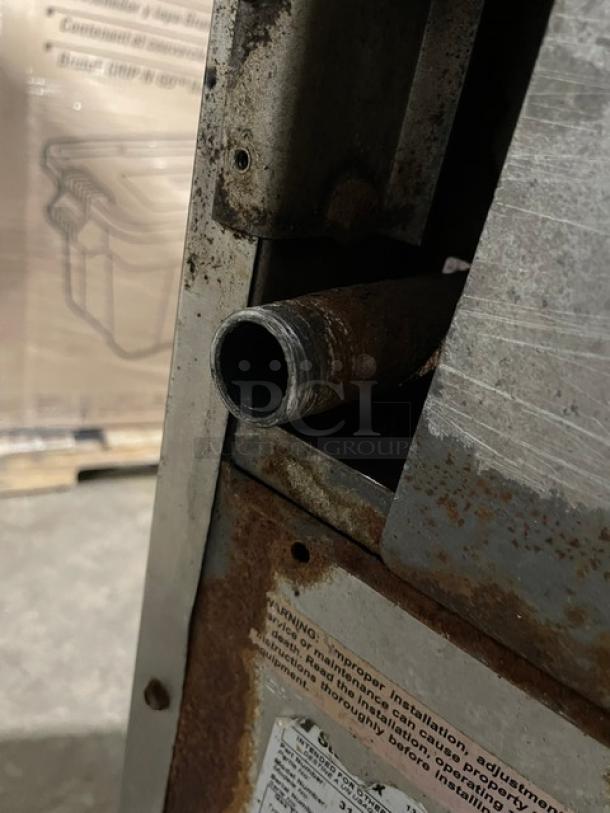 Bakers Pride 6-burner range/oven combo, model 36BP6BS30N, stainless steel, with rust and wear, on casters. Serial: 9910519050030.