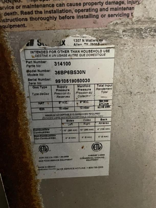 Bakers Pride 36BP6BS30N stainless steel range/oven, 6 burners, backsplash, salamander shelf, wired oven rack, on casters.