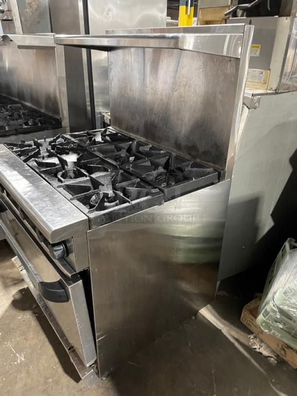 Radiance Turbo Air stainless steel 6-burner range/oven combo with backsplash, overhead salamander shelf, and wired oven rack.