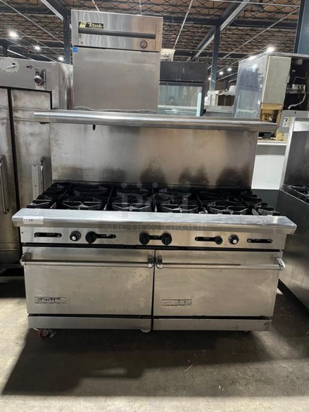 American Range stainless steel 10 burner range with double oven, natural gas powered, backsplash, salamander shelf, on casters.