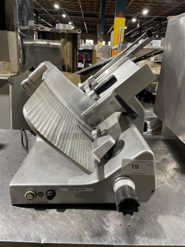 Kolossal 330IKUS electric deli meat slicer, 120V, on legs, good condition, visible control buttons, SN: 1590/08.