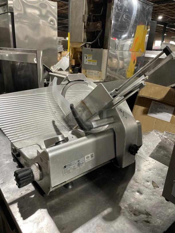 Kolossal 330IKUS commercial deli meat slicer, electric, countertop model with legs, 120V, serial number 1590/08, in used condition.