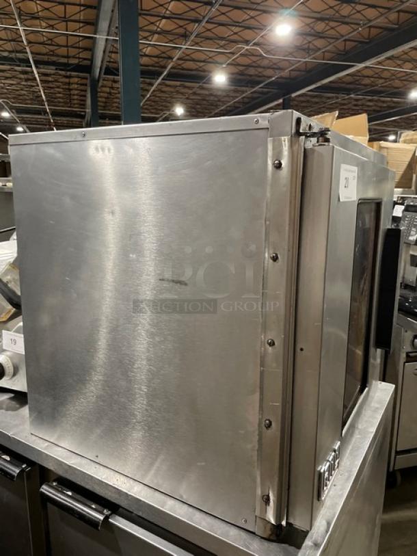 Lang commercial stainless steel convection oven, model EHS-C, with digital control and wired rack. 208V, 1/3 phase.