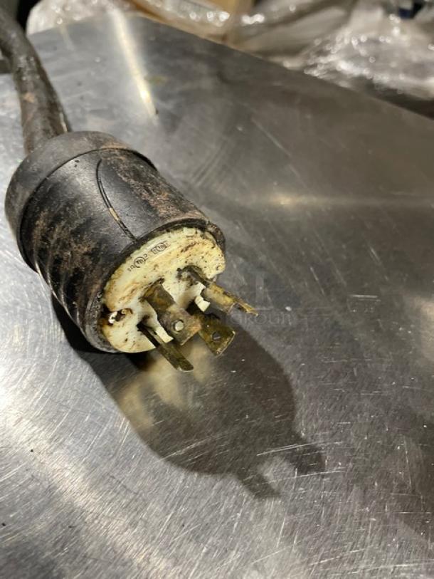 Lang EHS-C stainless steel convection oven plug, 208V 1/3 phase. Shows wear, black and white with visible pins.