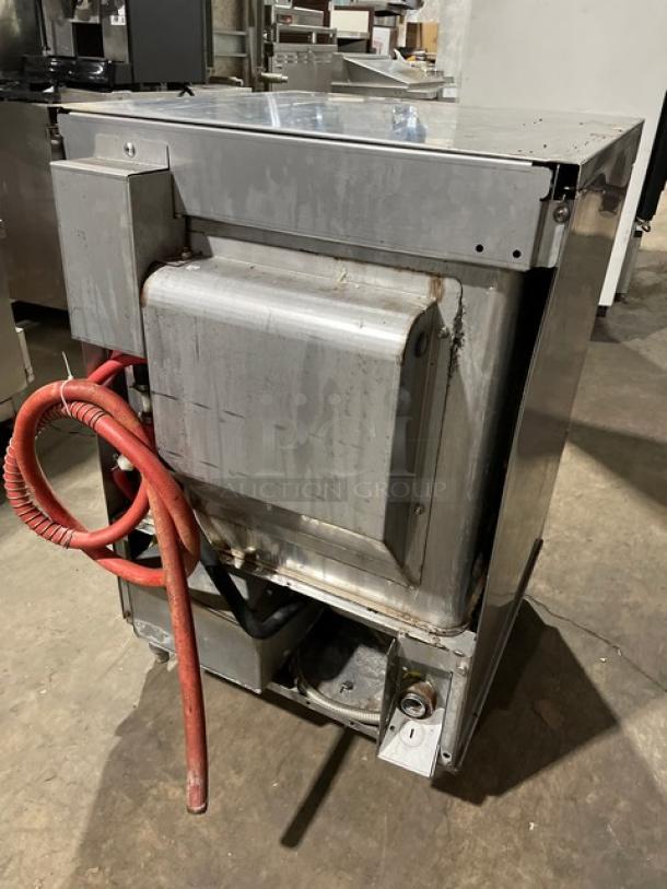 Hobart LXe Series stainless steel undercounter dishwasher on legs; electric powered; Energy Star certified; visible wear.