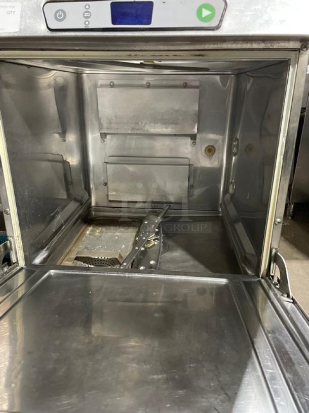 Hobart LXe Series commercial dishwasher, stainless steel, undercounter model with Energy Star rating, on legs, interior view.
