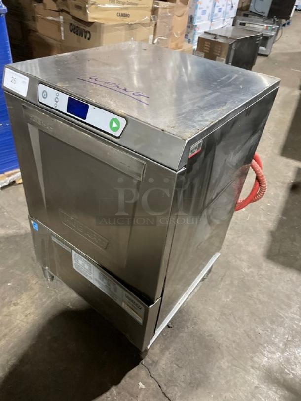Hobart LXe Series commercial stainless steel undercounter dishwasher on legs, electric powered, Energy Star certified, in used condition.