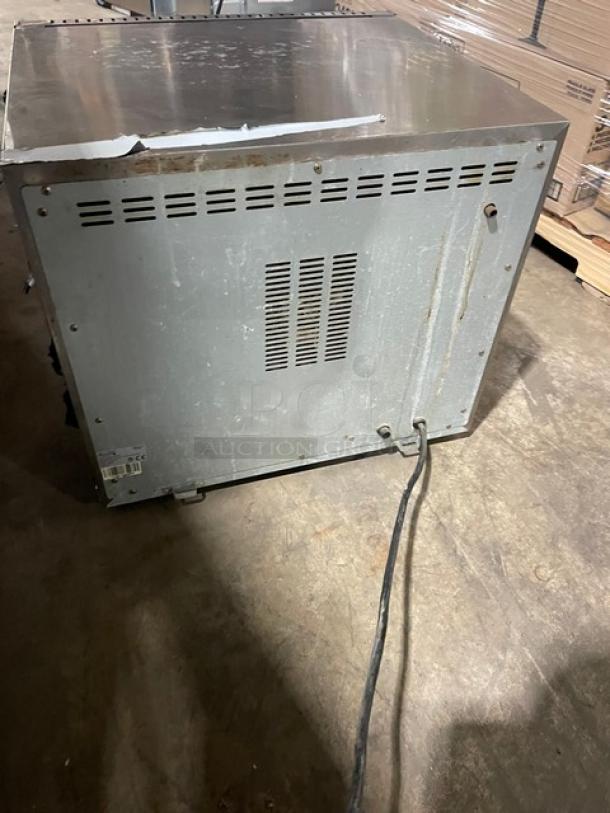Avantco 177CO28 stainless steel convection oven, electric, half-size, used condition, visible wiring, model info tag, 208-240V.