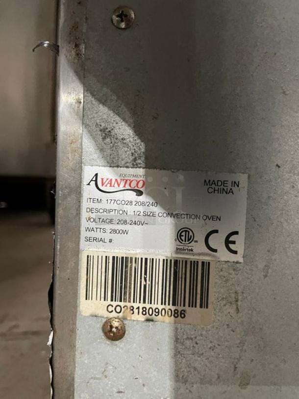 Avantco half-size convection oven, Model 177CO28, 208-240V. Stainless steel with wired oven rack. Serial CO2818090086.