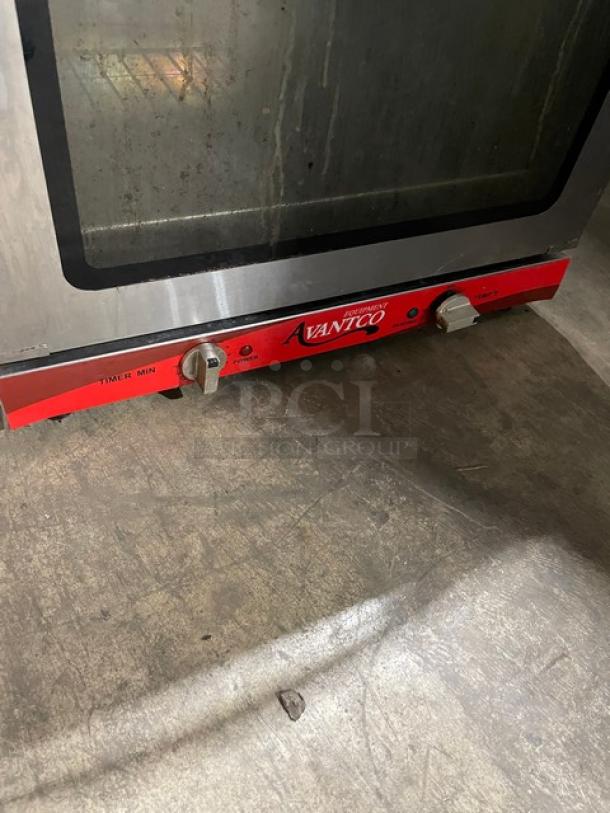 Avantco commercial stainless steel countertop convection oven, model 177CO28. Features wired oven rack, visible serial number CO2818090086, and control knobs.