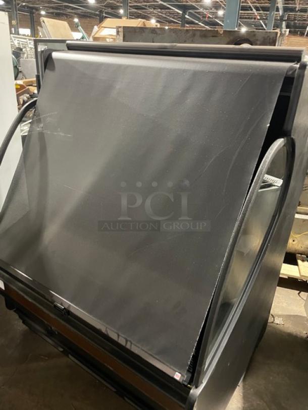 Structural Concepts Encore Series refrigerated merchandiser, black, multi-tier, with pull-down night curtain, Model HV48RSS3635C.