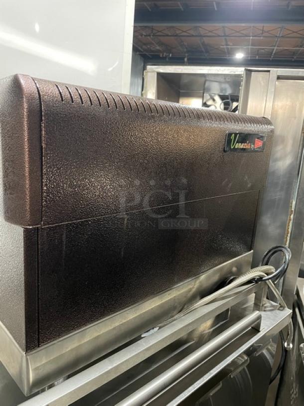 Cecilware Venezia ESP2 commercial espresso machine, stainless steel, with steam wand, drip tray, and visible "Venezia" label.