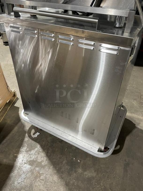 Carter-Hoffmann stainless steel single door meal tray cart model TE1S12, featuring a built-in pan slide and casters.