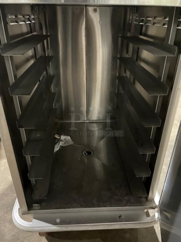 Carter-Hoffmann TE1S12 stainless steel meal/tray transport cart with built-in pan slides, on casters. Model TE1S12 SN: 462720-052012.