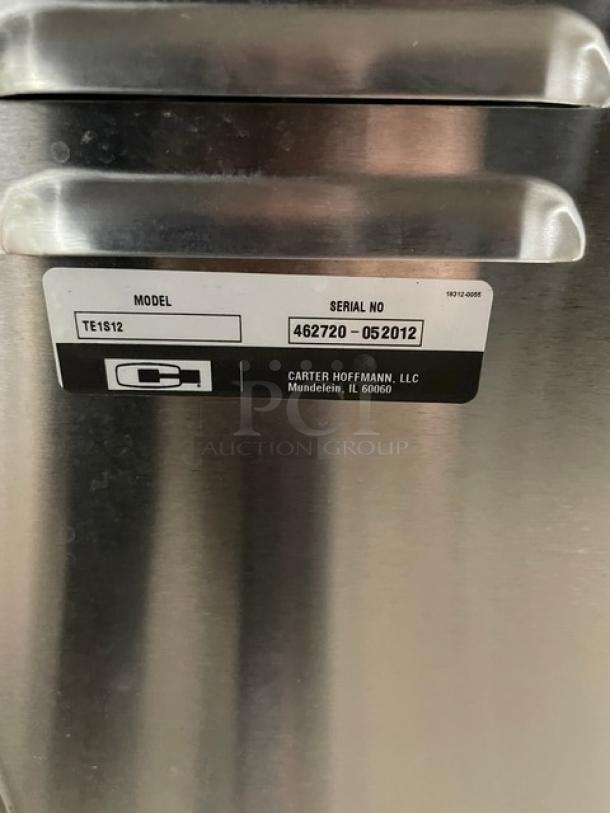 Carter-Hoffmann stainless steel transport cart, Model TE1S12, SN 462720-052012, with built-in pan slide, on casters.