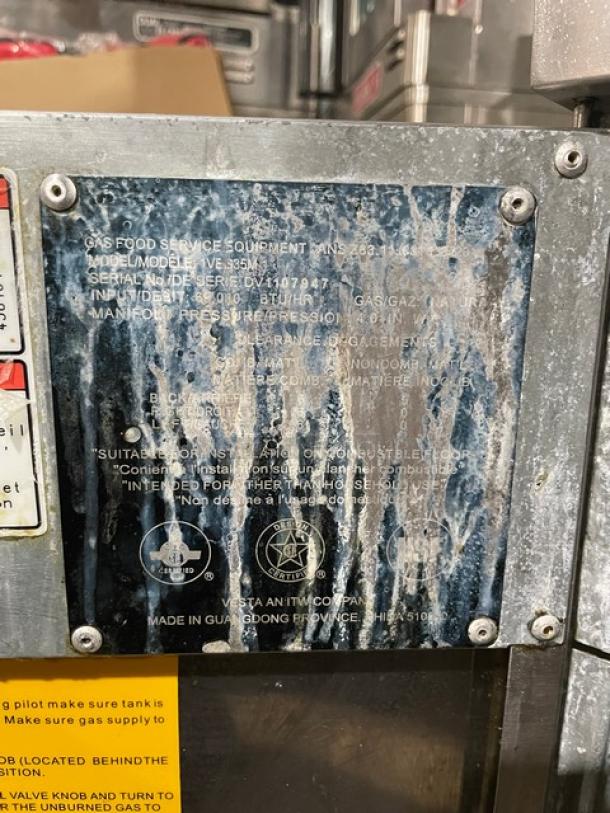 Vulcan commercial natural gas fryer, model 1VEG35M-1, Energy Star certified, with backsplash and basket hanger. Serial DV1107947.