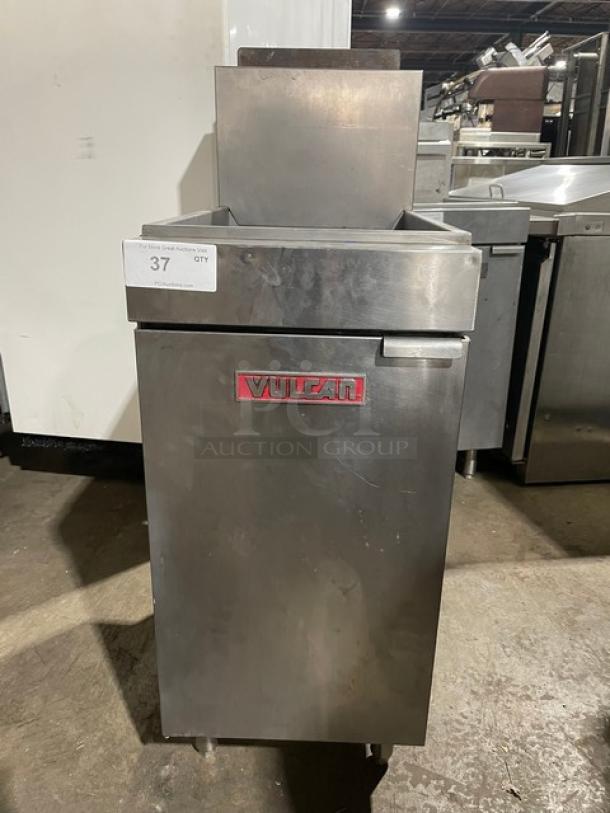 Vulcan LG400 commercial stainless steel deep fat fryer with back splash, natural gas powered, on legs, model SN: DV1048513.