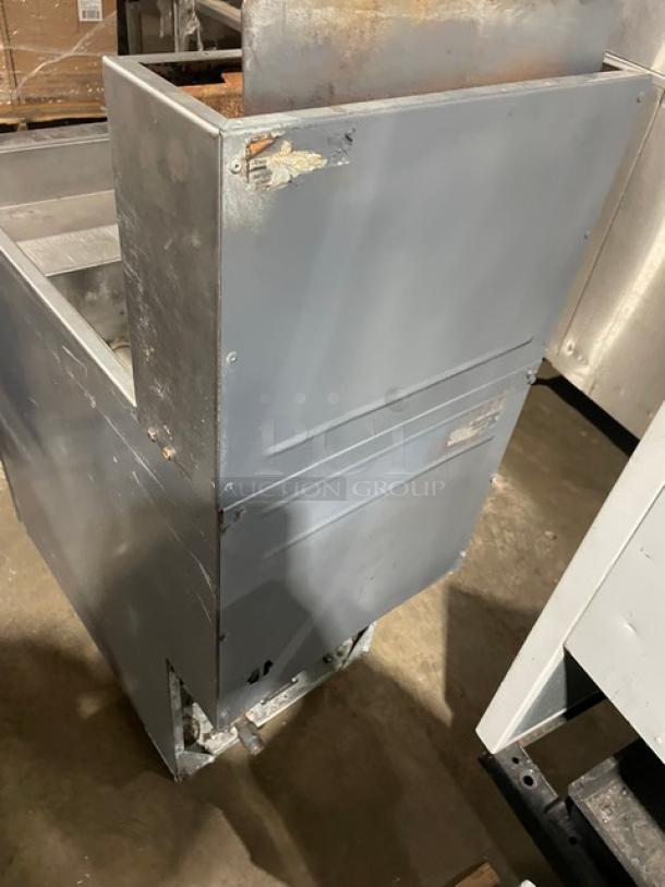 Vulcan LG400 commercial stainless steel deep fat fryer with back splash and legs; natural gas powered; some visible wear.