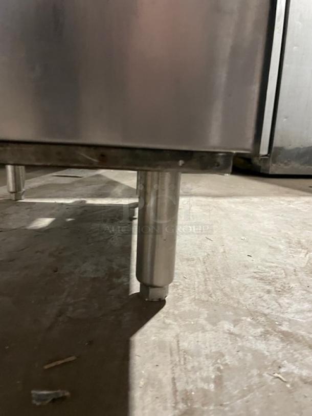 Vulcan LG400 commercial stainless steel deep fat fryer on legs, with backsplash and natural gas power, SN: DV1048513.