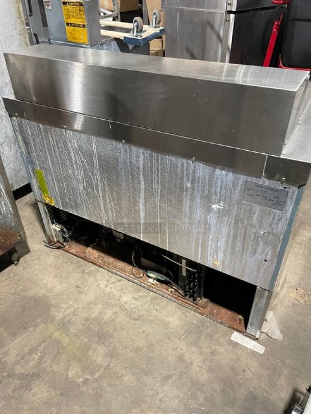 Entree S48MT stainless steel refrigerated prep table, two doors, bain marie style, model S48-MT, fair condition.