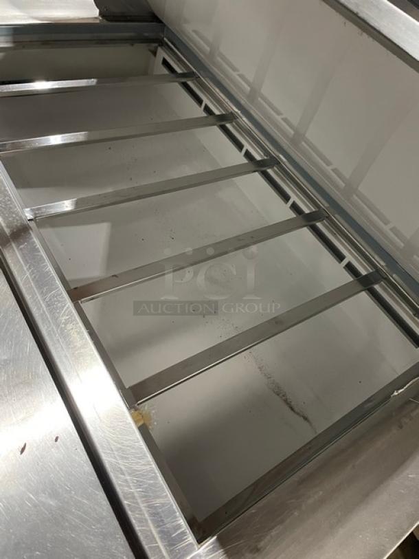 Entree S48MT stainless steel refrigerated prep table, bain marie style, 2 doors, serial 1608ENTH00088, 115V 1 Phase, used.