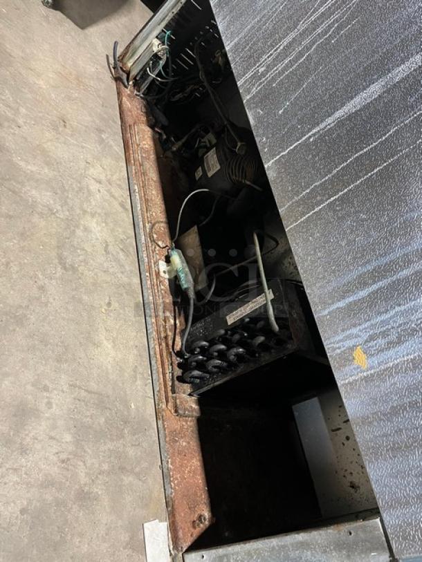 Entree S48MT 2 Door Stainless Steel Refrigerated Prep Table, Bain Marie style, visible wiring, moderate wear, 115V, 1 Phase.