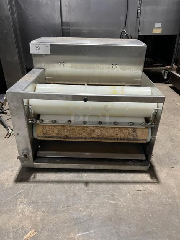Somerset commercial stainless steel electric dough moulder, compact design, visible wear. Tag number 39.