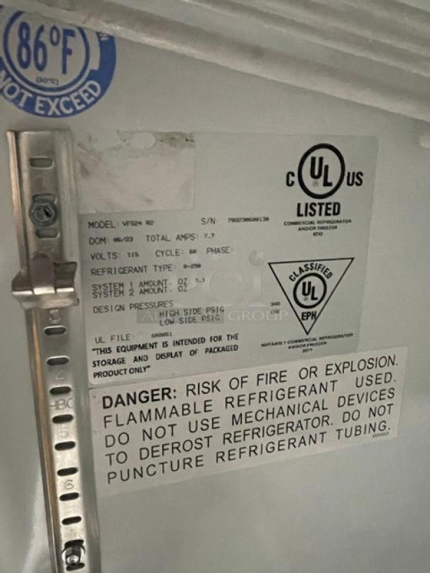 Imbera VFS24R2 merchandiser freezer tag, showing UL listing, 115V, single-phase, refrigerant type, and safety warnings.