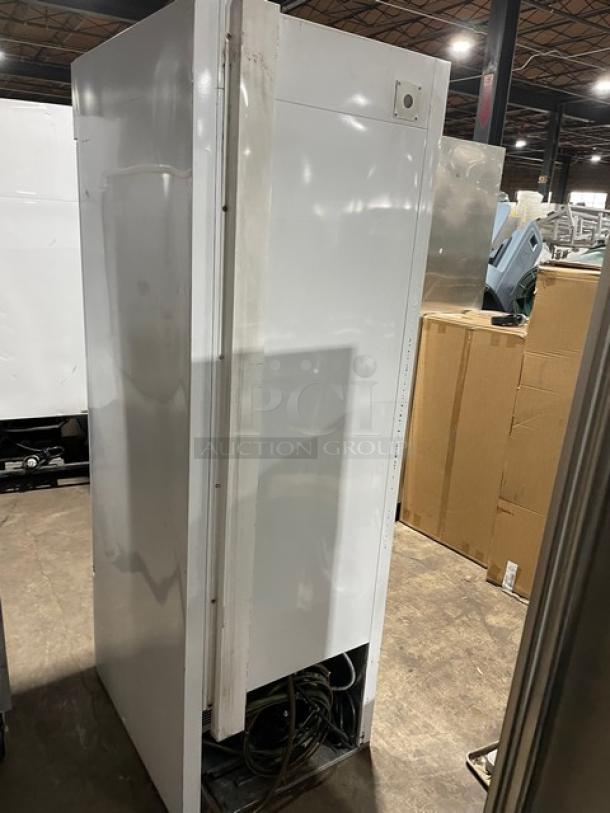 Beverage-Air CFG24-1 white commercial freezer, single glass swing door, poly coated wire rack, used condition.
