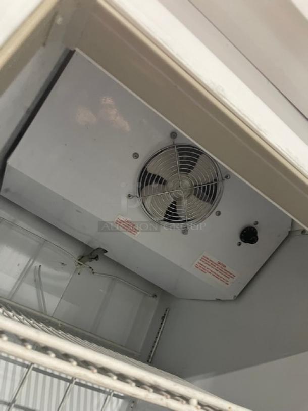 Beverage-Air CFG24-1 freezer interior with fan unit and poly-coated wire rack. Serial number 6851290. 115V, 1 phase.