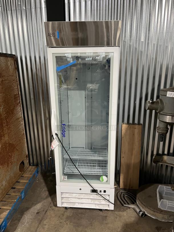 ABS commercial single glass door refrigerator, model PHABTHCS16GDJA, on casters with poly-coated wire rack, 115V.