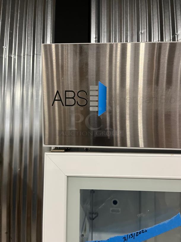 ABS Commercial Single Glass Door Refrigerator, Model PHABTHCS16GDJA, features poly-coated rack, on casters. Serial: ABS-21214371-2205.