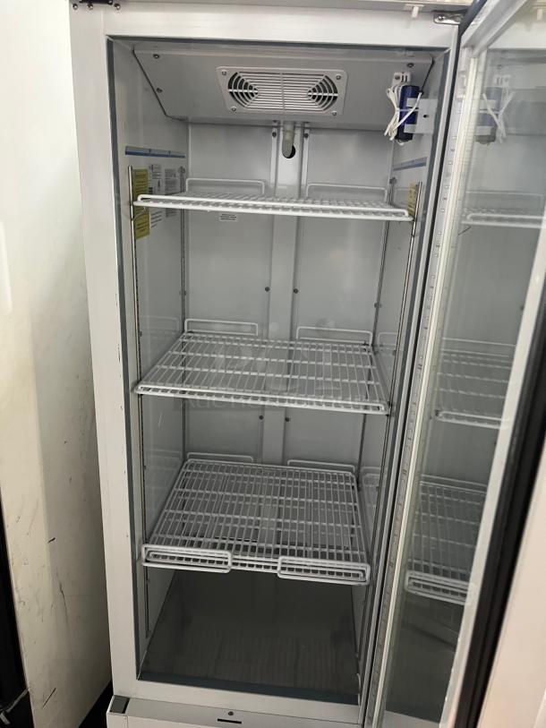 ABS Commercial White Single Glass Door Refrigerator, Model PHABTHCS16GDJA, poly-coated wire racks, on casters.