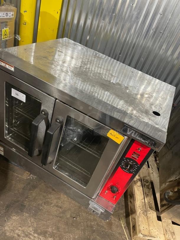 Vulcan stainless steel natural gas convection oven, single stack, with wired oven rack, excellent condition, visible controls.